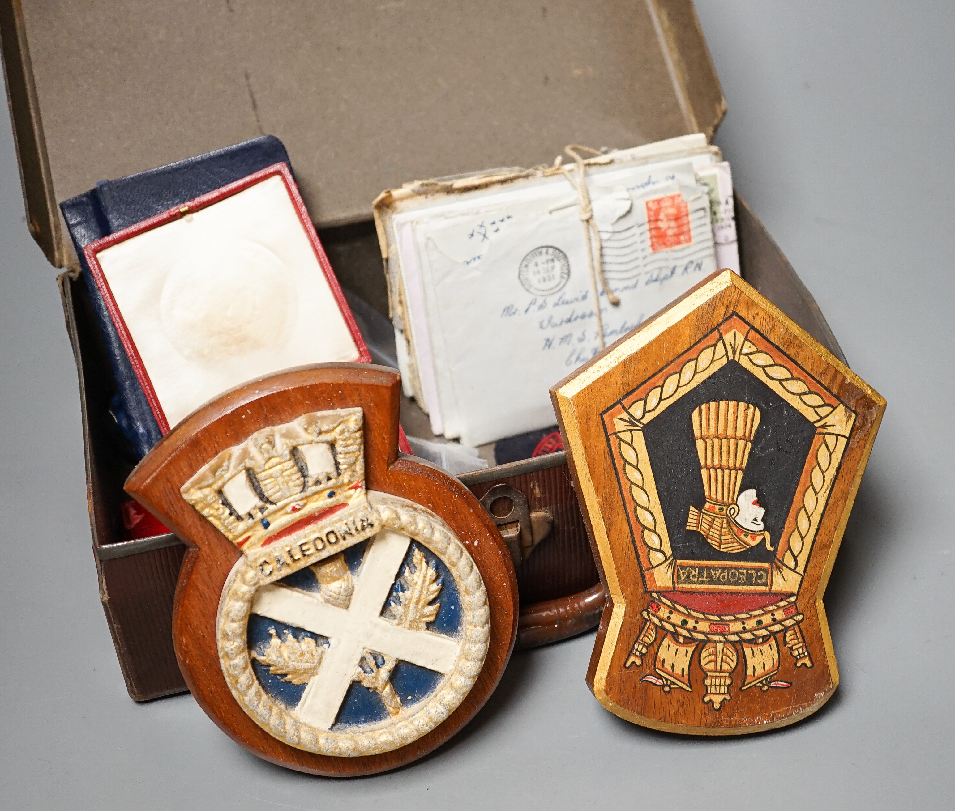 A group of naval related items including plaques, medals, diary, letters etc. and a group of coins.